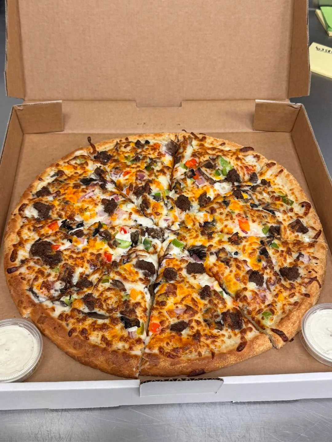 Specialty pizza selection at Next Level Pizza Restaurant, Medicine Hat AB